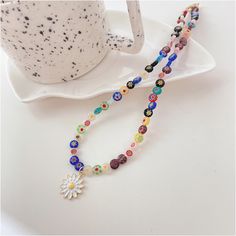 This Necklace With A Mini Spring looks special and cute! Color: Gold Plated Material: Alloy Measurement: Length: 16" + 2" Brand: Coseey Trendy Multicolor Flower Necklace With Colorful Beads, Trendy Beaded Flower Necklace Gift, Trendy Multicolor Beaded Flower Necklace, Trendy Charm Necklaces With Colorful Beads, Casual Gold Necklaces With Round Beads, Casual Beaded Chain Necklaces For Jewelry Making, Trendy Beaded Charm Necklaces, Trendy Beaded Charm Necklaces With Round Beads, Trendy Beaded Necklaces With Clavicle Chain