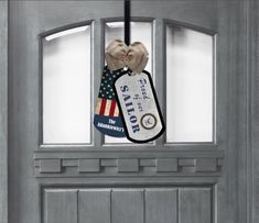 a door hanger with an american flag on it