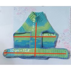 a crocheted bag is shown with measurements