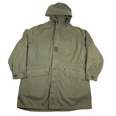 - Fits a L/XL       - No major flaws(see photos) - Great overall condition  - Removable liner  - Please refer to measurements for sizing// measurements start from pit to pit- length from back of collar to bottom of item- sleeve length from collar to end of sleeve  - 24.5 x 35 x 31 inches Vintage Green Parka For Streetwear, Vintage Khaki Outerwear For Cold Weather, Vintage Hooded Hunting Outerwear, Vintage Hooded Outerwear For Hunting, Vintage Khaki Parka For Outdoor, Vintage Long Sleeve Parka For Hunting, Vintage Khaki Hooded Outerwear, Vintage Solid Color Outdoor Outerwear, Combat Style Cotton Hunting Outerwear