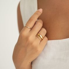 A statement ring with a puffy tapered design, crafted in gold vermeil. 

Band width: 2mm - 6.4mm
 Size: 5, 6, 7, 8, 9 Modern Tarnish-resistant Wide Band Ring, Gold Stackable Rings With Thick Band, Classic Yellow Gold Wide Band Ring, Tarnish Resistant, Classic Gold Plated Dome Ring, Gold Signet Ring With Thick Band Stackable, Classic Gold-plated Dome Ring, Gold Thick Band Stackable Signet Ring, Gold Signet Ring Stackable With Thick Band, Gold Stackable Signet Ring With Thick Band