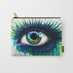 an eye with blue and green paint on it carry - all pouch bag by artfuls