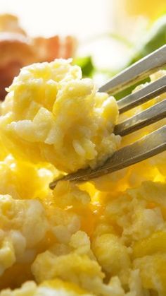 a close up of food on a plate with a fork sticking out of the top