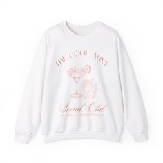 Calling all new Aunties! It's your turn to join The Cool Aunt Social Club. Our stylish graphic sweatshirt is the PERFECT gift for your Aunt or to share an exciting new baby announcement. She will be delighted to receive this high quality crewneck from her niece or nephew. It's the ideal gift for your favorite Cool Aunt.  This classic, unisex crewneck will fit like a well-loved favorite from its first wear. Our ultra soft Gildan crewnecks feature... - Medium weight fabric with a 50/50 cotton & polyester blend - Tear away label and no side seams - True to size fit - available in a range of sizes! Questions about sizing? Please refer to the size chart included in our listings! Wish you could customise this item? Don't hesitate to contact me! I'm always happy to help you find the colour or des White Logo Print Sweatshirt For Loungewear, White Graphic Print Long Sleeve Sweats, Spring Graphic Print Crew Neck Sweats, White Long Sleeve Sweats With Graphic Print, White Text Print Sweatshirt For Loungewear, Crew Neck Sweats With Letter Print For Spring, Graphic Print Crew Neck Sweatshirt For Loungewear, Loungewear Graphic Print Crew Neck Sweater, Graphic Print Crew Neck Sweater For Loungewear