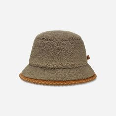 The UGG®fluff Scalloped Hat blends texture with plush fleece and playful scallop trim. | Plush fleece bucket hat. Self - 100% Polyester. Plush fleece Lining - 100% Polyester. Features a scalloped trim on brim. Leather label with Graphic UGG® Font. Imported. | UGG® Women's UGG®fluff Scalloped Hat Fleece Hats in Moss Green, Size S/M Casual Fleece-lined Hat With Curved Brim, Casual Hat With Fleece Lining And Curved Brim, Casual Hats With Fleece Lining And Curved Brim, Casual Curved Brim Hat With Fleece Lining, Casual Adjustable Hat With Plush Lining, Casual Adjustable Hats With Plush Lining, Casual Brimmed Hat With Faux Fur Lining, Winter Outdoor Brown Bucket Hat, Casual Brimmed Hat With Plush Lining