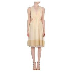 Vanessa Bruno's whisper-weight silk-georgette dress is a delicate way to dip into spring’s neutral trend. This semi-sheer runway style comes with a slip to line. Keep the look contemporary by wearing yours with a box clutch and statement cuff. Pale orange sleeveless silk dress from Vanessa Bruno featuring a v-neckline, ruche detailing at the chest, a cinched empire line, a pleated skirt section with a contrasting nude hem and a nude sheer rear and side panel. 100%silk. V-neckline, gathered shoul Chic Silk Chiffon Midi Dress For Spring, Spring Chic Silk Chiffon Midi Dress, Sheer Fitted Silk Dress For Spring, Fitted Sheer Silk Dress For Spring, Chic Sheer Silk Dress, Chic Silk Chiffon Midi Dress, Chic Summer Silk Chiffon Midi Dress, Silk Chiffon Midi Dress For Summer, Sheer Silk Evening Dress For Spring