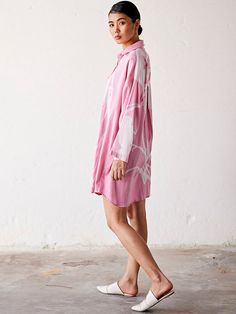 VALUES Handcrafted Organic Fair Minimal Waste CURATOR'S NOTE Stroll through the summer garden in style this season with our luxe Summer Garden Shirt Dress. Constructed from a delicate pale pink floral lino print, this dress features a classic front button opening and a folded sleeve hem for an understated yet sophisticated look. Finished with convenient patch pockets, this timeless dress is also fully lined for added comfort and style. Perfect for any special occasion. THE DESIGNER STORY KHARA K Spring Relaxed Fit Shirt Dress For Daywear, Feminine Linen Dress For Garden Party In Spring, Spring Shirt Dress With Spread Collar For Daywear, Spring Daywear Shirt Dress With Spread Collar, Relaxed Fit Shirt Dress For Spring And Summer, Summer Linen Long Sleeve Dress For Garden Party, Pink Floral Print Shirt Dress For Summer, Feminine Spring Cotton Shirt Dress, Feminine Cotton Shirt Dress For Spring