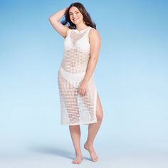 This Crochet Cover-Up Midi Dress from Shade & Shore™ will keep you looking and feeling your best before and after swimming. Made from breathable 100% cotton in an off-white hue, this crochet cover-up dress features a slightly sheer construction with holes to show off the stylish swimsuit you're wearing underneath. Designed in a midi length, it's the perfect pick for beach vacations or days spent relaxing by the pool. Shade & Shore™: Found exclusively at Target. White Cotton Cover-up For Warm Weather, White Crochet Beachwear Dress For Poolside, Fitted White Crochet Beach Dress, White Crochet Dress For Poolside And Beach Season, White Fitted Crochet Dress For Beach, Fitted White Crochet Dress For Beach, White Crochet Dress For Poolside In Spring, White Crochet Dress For Poolside Spring Events, White Crochet Dress For Poolside Spring Occasion