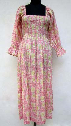 "ITEM DESCRIPTION pink blossom party wear women printed long maxi dress - square neckline with smocked Indian maxi dress - long sleeve ethnic wear maxi dress Features: Long sleeve, V neck, Long dress Material: Cotton cambric Fabric: 100% cotton soft light weight ethnic print fabrics Sleeve Length = 22 inch For more sizes & their measurement, please refer our below chart to understand the sizes variations available with us For your size requirement, please mention your size in seller note at the Pink Smocked Maxi Dress For Spring, Pink Maxi Length Smocked Dress For Spring, Pink Maxi Dress With Gathered Sleeves For Spring, Pink Floral Print Maxi Dress With Square Neck, Pink Fitted Maxi Dress With Gathered Sleeves, Fitted Pink Maxi Dress With Gathered Sleeves, Pink Long Sleeve Dress With Smocked Back, Spring Pink Smocked Dress With Gathered Sleeves, Bohemian Pink Square Neck Dress