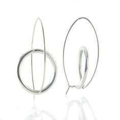 Silver Earrings - Sterling silver twist on classic hoops, perfect for everyday wear. Available in matte, oxidized, and polished finishes, these earrings effortlessly blend style and versatility to complement any look with understated elegance. Silver Hoop Earrings With A Modern Twist, Modern Twist Silver Earrings For Everyday, Everyday Silver Earrings With A Modern Twist, Minimalist Oxidized Hoop Earrings, Small Hoop Oxidized Minimalist Earrings, Minimalist Small Hoop Earrings With Oxidized Finish, Modern Silver Hoop Earrings With Oxidized Finish, Modern Oxidized Hoop Earrings For Everyday, Modern Hand Forged Circle Hoop Earrings