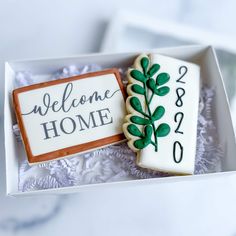 a welcome home cookie in a white box