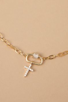 The delicate paperclip chain adds a modern edge, while the sparkling rhinestone cross pendant offers a symbol of faith. Perfect for layering with other necklaces or on its own, this necklace is a versatile must-have. Cross Layered Necklace, Stacked Jewelry Necklaces, Cross Chain Necklace, Cross Charm Necklace, Faith Apparel, Necklace Stack, Preppy Jewelry, Faith Jewelry, Crystal Cross