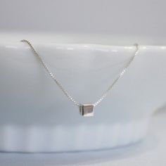 Sterling Silver Cube Necklace Sterling Silver by alexandreasjewels Minimalist Silver Charm Necklace With Box Chain, Silver Cube Jewelry For Gifts, Minimalist Sterling Silver Charm Necklace With Box Chain, Dainty Sterling Silver Charm Necklace With Square Pendant, Minimalist Silver Square Necklace, Minimalist Square Silver Necklace, Silver Rectangular Charm Necklace With Box Chain, Sterling Silver Charm Necklace With Square Pendant, Square Sterling Silver Necklace In Silver