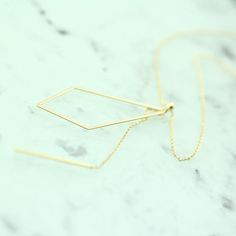 "Geometric Necklace, 14K Solid Gold Geometric Double Layered Necklace, Minimalist Necklace, 14K Solid Gold Casual Necklace, Pendant Necklace ≫ Product Details ◈ Metal: Solid 14K Gold ◈ Gold Weight: Approx. 3.0g ◈ Gold Color: White Gold ◈ Chain Length: 16\" + 2\" adjustable ≫ Please read our FAQ below for more detail." Minimalist Gold Lariat Necklace With Cable Chain, Minimalist 14k Yellow Gold Lariat Necklace, Modern 14k Yellow Gold Filled Necklaces, Modern 14k Gold Filled Yellow Gold Necklace, Modern 14k Gold-filled Yellow Gold Necklace, Minimalist Yellow Gold Lariat Necklace In Sterling Silver, Minimalist 14k Gold Lariat Necklace With Delicate Chain, Minimalist Yellow Gold Sterling Silver Lariat Necklace, Gold Sterling Silver Diamond-shaped Necklace