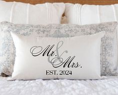 a white pillow with the word mr and mrs on it