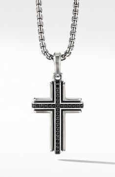 Sterling silver. Pavé black diamonds, 0.28 total carat weight. Pendant, 34mm. Please note: pendant only, chain sold separately. Imported. Black Engraved Necklaces For Anniversary, Engraved Black Necklaces For Anniversary, Sterling Silver Black Diamond Pendant Necklace, Luxury White Gold Jewelry With Black Spinel, Luxury Black Cross Pendant Necklace, Sterling Silver Pendant Necklace With Black Diamonds, Black Sterling Silver Necklace, Formal Gunmetal Box Chain Jewelry, Black Sterling Silver Box Chain Jewelry