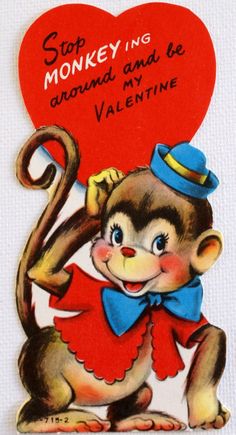 a valentine card with a monkey holding a heart