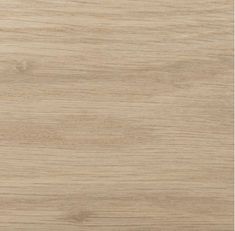 a close up view of the wood grains on a table top, with light brown tones