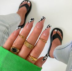 Embrace the animal print, and tell everyone to Moo Out The Way! — because you’re bringing cow print nails back into the limelight. With a sharp side tip design, these medium coffin nails combine a classic white and pure black to create a modern take on animal print nails. Apply with acrylic, nail glue, or tabs and get long-lasting, salon-quality nails in minutes. Shape: CoffinLength: Medium "Ditch the plastic! Kiara Sky’s xPress Pro Press-on Nails are 100% acrylic and 100% fabulous! Designed to Black And White Animal Print Nails, Cute Country Acrylic Nails, Cow Print Acrylic Nails, Nails Hacks, Medium Coffin Nails, Fingernails Painted