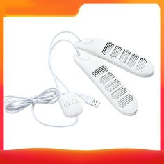 two wii remotes sitting next to each other on top of a white surface with an orange and red background