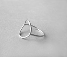 This geometrical ring is hand made from sterling silver wire. The diameter of the circle is 1,5 cm (0,6 inch). This ring is made to order; please make sure you choose your size. Convo me if your size is not available. Feel free to ask me if you don't know which is the right size for you. Each ring is handmade to order and may slightly vary from the pictures. Please allow for subtle variations making each handmade piece unique. ----> All International Shipping is registered, with tracking numb Open Circle Ring, Double Rings, Everyday Jewellery, Circle Ring, Ring Minimalist, Double Ring, Dainty Ring, Everyday Jewelry, Stacking Ring