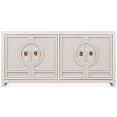 a white cabinet with three doors and two handles