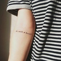 a woman's arm with a tattoo that reads, i love you to the moon and back