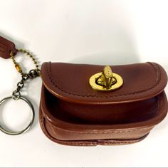 Coach Vtg. Leather City Key Fob, Handcrafted In The 1990, Body Measurements 3.25x3 Solid Brass Turnlock Closure, Attached Split Key Ring, Mini Hangtag. Great Condition, Expect Small Stain On The Bottom, It Doesn’t Show Only When Turned. Classic Leather Coin Purse With Interior Key Chain Holder, Brown Coach Wallet With Interior Key Chain Holder, Classic Formal Coin Purse With Interior Key Chain Holder, Brown Rectangular Coach Coin Purse, Coach Rectangular Brown Coin Purse, Classic Leather Coin Purse With Snap Closure, Classic Coach Coin Purse With Coin Pocket, Classic Coach Coin Purse, Leather Rectangular Coin Purse With Interior Key Chain Holder