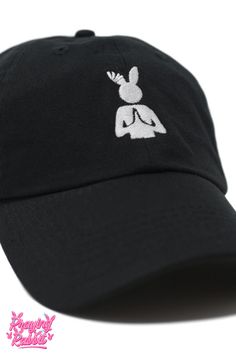 This praying rabbit hat is the perfect gift for any grunge lover. The embroidered Praying Rabbit logo gives it a unique and stylish look, while the adjustable closure ensures a perfect fit. Made from 100% cotton, this hat has a slightly deeper fit and is designed to fit most heads. Order yours today at PrayingRabbit.com! Rabbit Logo, Rabbit Hat, Streetwear Hats, Og Logo, Edgy Streetwear, Logo Hat, Denim Hat