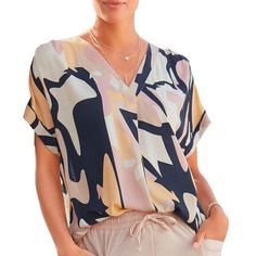 With its trendy print, this blouse is a statement piece. * Deep V-neckline with inverted pleats * Short sleeves with fixed turn-up * Rounded hem * Print may vary * Back length approx. 26 inches * 100% viscose. Sustainable viscose. Imported. * Machine wash cold with like colors, inside out * Hang to dry or lay flat Body Lingerie, 2024 Fashion Trends, Oversized Flannel, Summer Blouse, Stylish Blouse, Trendy Prints, Satin Shirt, Pleated Shorts, Business Look