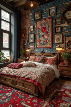 a bed sitting in a bedroom next to a window with lots of pictures on the wall