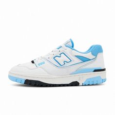 a white and blue new balance shoe on a white background