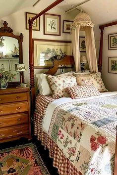 a bed sitting under a canopy in a bedroom next to a dresser with drawers on it