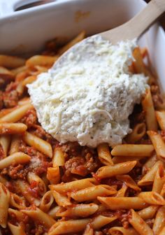 pasta with meat and cheese in a white dish