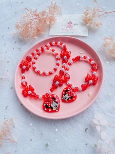 Minnie Mouse jewellery SET featuring bubblegum beads necklace and bracelet, designed for toddler and young girls age 3+ Bubblegum beads are slightly various in size, large heart pendant approx. 4cm,  made from stretchy cords, it would fit young girls age from 3 yrs and above. So cute and adorable! 🥰Perfect for a birthday party dress up, 1st birthday photo shoot, or just a beautiful gift for your loved ones. 💝 🎁 Check out our gift-wrapping section!  🎁  💝 If you'd like it gift-wrapped & sent to your little recipient directly, you can purchase very presentable and sturdy gift box from my shop for a much cheaper price than the stores. ** This is not a toy and not suitable for child under 3 years old as it contains beads. ** Please always take care with small children as hair accessories m Minnie 1st Birthday, Mouse Necklace, Minnie Mouse 1st Birthday, Minnie Birthday Party, Minnie Mouse Dress, 1st Birthday Photos, Birthday Party Outfits, Minnie Mouse Birthday Party, Minnie Birthday