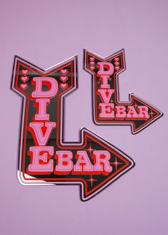 two red and black stickers with the words divve bar on them are shown