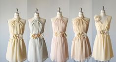 four dresses on mannequins in different colors and sizes, all with bows