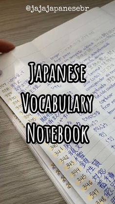 an open notebook with writing on it and the words japanese vocabuary notebook written in