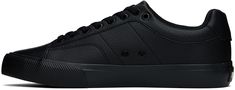 Low-top pebble grained faux-leather sneakers in black. · Lace-up closure · Logo embossed at padded tongue and side · Padded collar · Eyelets at inner side · Logo flag at heel tab · Mesh lining · Treaded rubber sole Supplier color: Black Leather Sneakers With Vulcanized Sole For Skateboarding, Leather Skate Shoes With Vulcanized Sole, Leather Skate Shoes With Studded Rubber Outsoles For Sports, Leather Skate Shoes With Studded Rubber Outsoles, Leather Skate Shoes With Textured Sole, Sporty Black Skate Shoes With Embossed Logo, Classic Leather High-top Sneakers For Skateboarding, Black Leather Skate Shoes With Speckled Midsole, Black Skate Shoes With Textured Sole For Sports