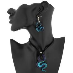 These trendy Venetian Snake Pendant and Earrings Set showcases the best in Murano Glass craftsmanship and design. A symbol of elegance and wisdom, these fine snakes make a perfect accent to any outfit and will work equally well for a special occasion or every day. This Murano Glass Pendant and Earrings make a killer combination which will leave everyone dazzled. Also a wonderful symbolic gift to a woman who values uniqueness, elegance, and exquisite look and feel of Murano's famous jewelry. Meas Artistic Adjustable Jewelry For Parties, Artistic Adjustable Jewelry For Party, Eye-catching Multicolor Jewelry For Party, Artistic Dangle Jewelry For Party, Artistic Dangle Party Jewelry, Multicolor Pendant Jewelry Sets, Unique Multicolor Party Jewelry, Eye-catching Multicolor Party Jewelry, Artistic Green Jewelry For Party