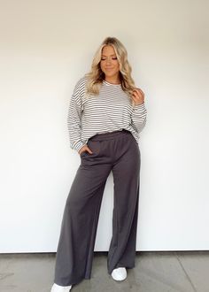 charcoal Black Wide Leg Lounge Pants Outfit, Gray Pants Outfit Summer, Sweatshirt And Dress Pants, Modern Mom Outfits Winter, Modest Midsize Summer Outfits, Sweatpants Outfit For Work, Wide Leg Lounge Pants Outfit, Grey Wide Leg Pants Outfit, Rainy Day Teacher Outfit