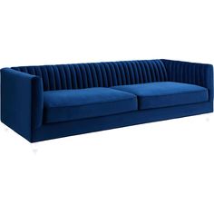 a blue velvet sofa with chrome legs