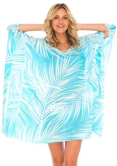 Having a stylish beach cover up is a must! The beautifully printed tunic beach coverup creates a vibrant look. Easy to pull on and easy to pack. Making clothes for the traveling woman. Boho design Lightweight beach dress Semi-Sheer Hand wash in cold water, hang to dry Blue Flowy Breezy Cover-up, Blue Breezy Flowy Cover-up, Tropical Long Sleeve Cover-up For Beach Season, Blue Flowy Cover-up For Beach Season, Blue Summer Cover-up With Upf 50+, Beachy Printed Pool Cover-up, Tropical Long Sleeve Beach Dress, Casual Blue Cover-up With Upf 50+, Beachy Green Cover-up With Tropical Print