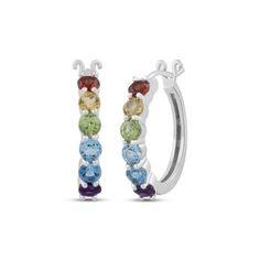 Natural gemstones create a prismatic display along these colorful hoop earrings. Sterling silver Round-cut gemstones including garnet, citrine, peridot, sky blue topaz, Swiss blue topaz and amethyst line each hoop Hinged backs Multicolor Gemstone Hoop Earrings In Fine Jewelry Style, Anniversary Blue Topaz Multi-stone Earrings, Nickel-free Multicolor Sterling Silver Hoop Earrings, Multi-stone Blue Topaz Earrings As Gift, Multicolor Multi-stone Hoop Earrings, Sky Blue Topaz, Swiss Blue Topaz, Accessories Jewelry Earrings, Earrings Sterling Silver