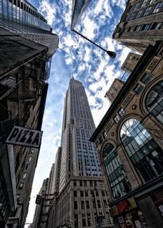 looking up at the tall buildings in new york city