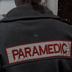 a paramedic jacket with the words paramedic written on it's back