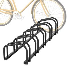 four bike racks are shown with one bicycle on it