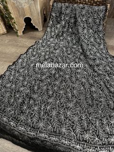 Beautiful and lightweight Chikankari hand embroidered geoDupatta with crochet lace. Black Georgette Dupatta With Floral Embroidery, Black Embroidered Georgette Dupatta, Black Bohemian Embroidered Fabric With Zari Work, Black Chikankari Embroidered Fabric For Eid, Semi-stitched Black Dupatta With Chikankari Embroidery, Bohemian Lace Dupatta With Lace Work, Black Chikankari Embroidery Semi-stitched Fabric, Traditional Black Fabric With Chikankari Embroidery, Black Chikankari Embroidery Fabric