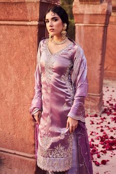 Dusty purple kurta with zari thread embroidered floral vine motifs highlighted by sequins. Comes with palazzo and scalloped sequin embroidered dupatta. - Aza Fashions Unstitched Purple Traditional Wear For Reception, Lavender Semi-stitched Dress For Eid, Unstitched Purple Salwar Kameez For Reception, Lavender Anarkali Salwar Kameez, Lavender Semi-stitched Salwar Kameez For Eid, Lavender Semi-stitched Dress With Resham Embroidery, Traditional Lavender Dress With Chikankari Embroidery, Lavender Resham Embroidery Tailored Fit Dress, Fitted Purple Dola Silk Dress