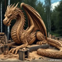 a carved wooden dragon sitting on top of a pile of wood